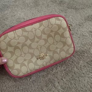 Gently used Coach camera bag in summer pink